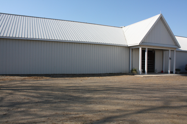 white stable building at Blairwood Farms